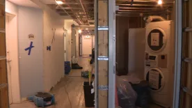 ‘I’ve had a couple of tears’: Families flee, repairs needed after emergency shelter floods